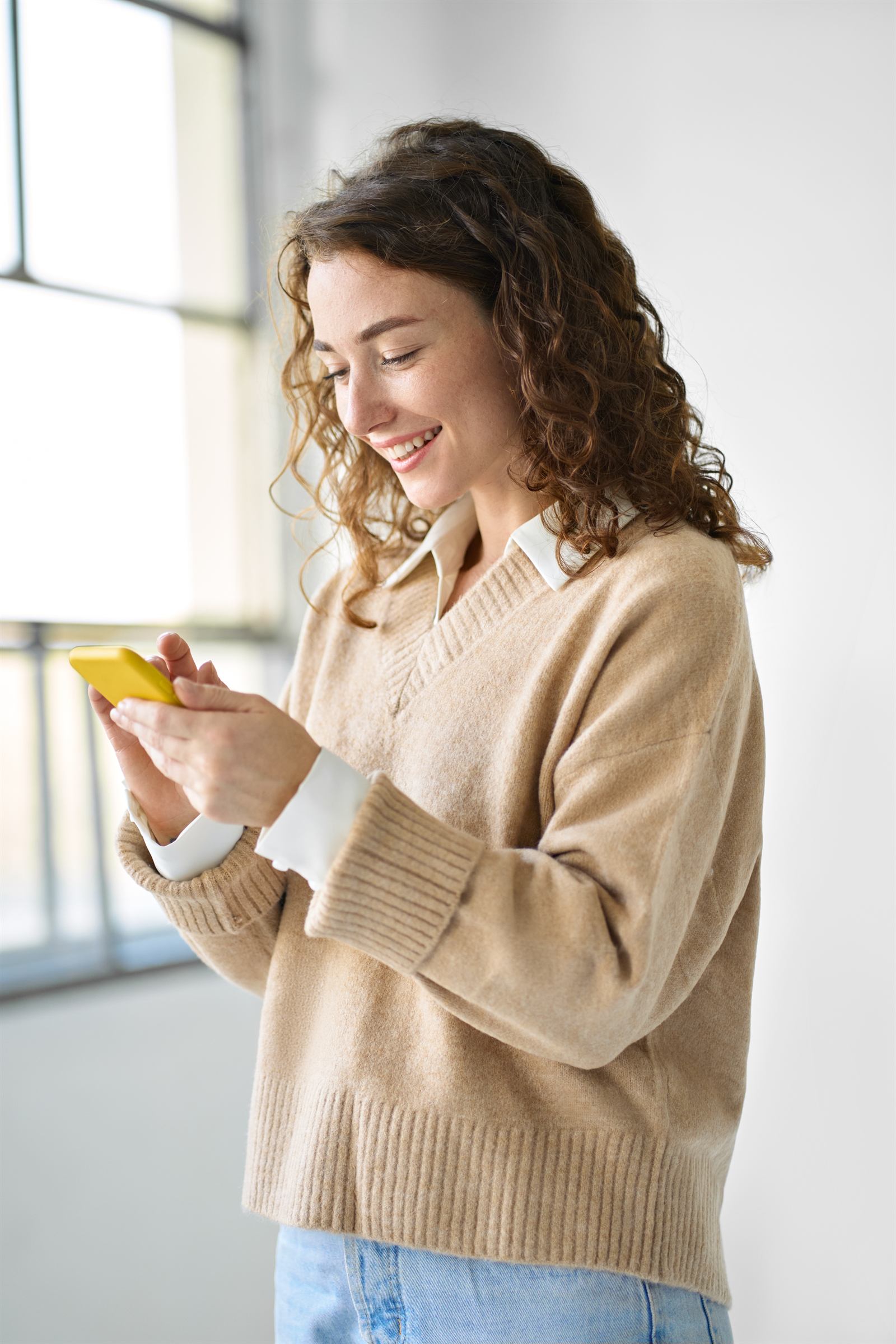 An employee booking a collection slot from her phone